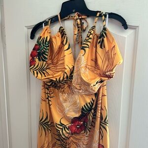 Long flowing halter style backless summer dress. Tropical print yellow dress.